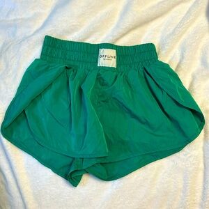 green offline aerie running shorts